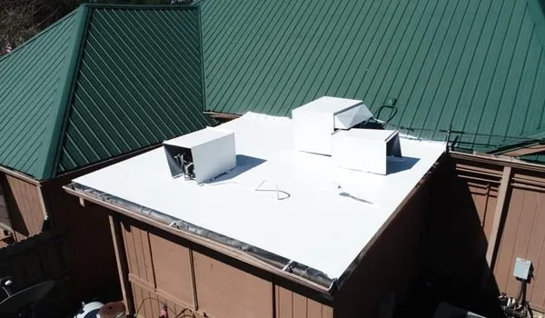 Commercial single-ply roofing restoration with leak prevention and extended roof life