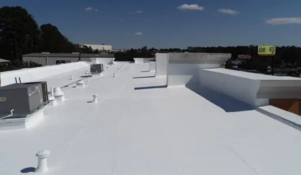 Professional commercial roof restoration work demonstrating expert craftsmanship and long-lasting protection solutions